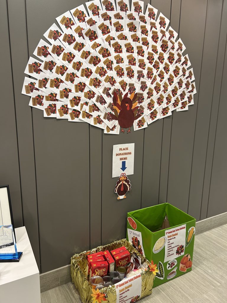 A turkey fan made out of cards
Description automatically generated