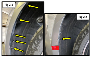 A close-up of a car's tire

Description automatically generated