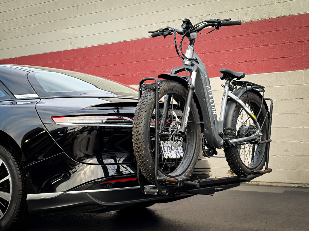 lucid air carrying ebike with hitch-mounted bike rack