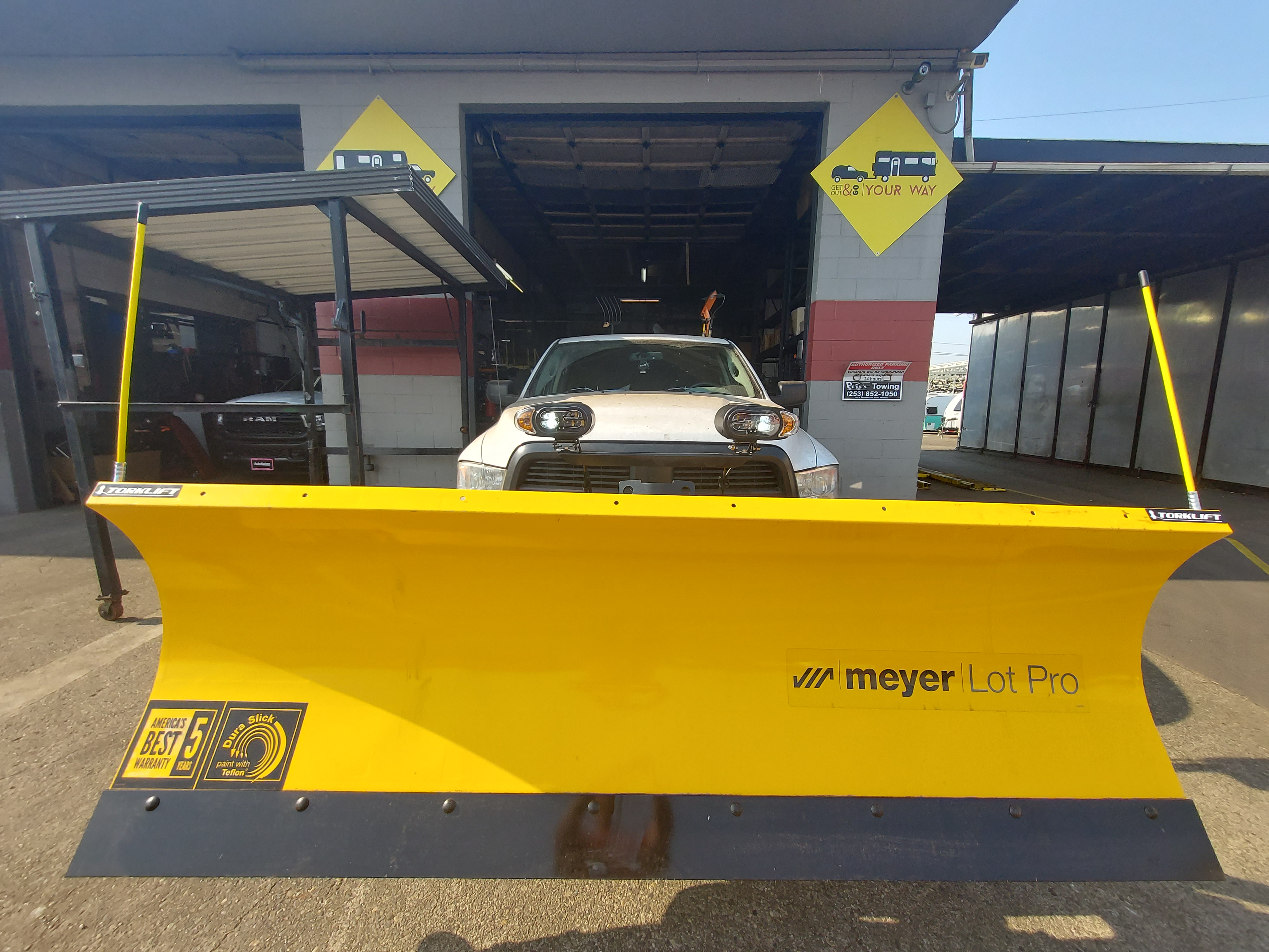 Snow plow installed on a truck