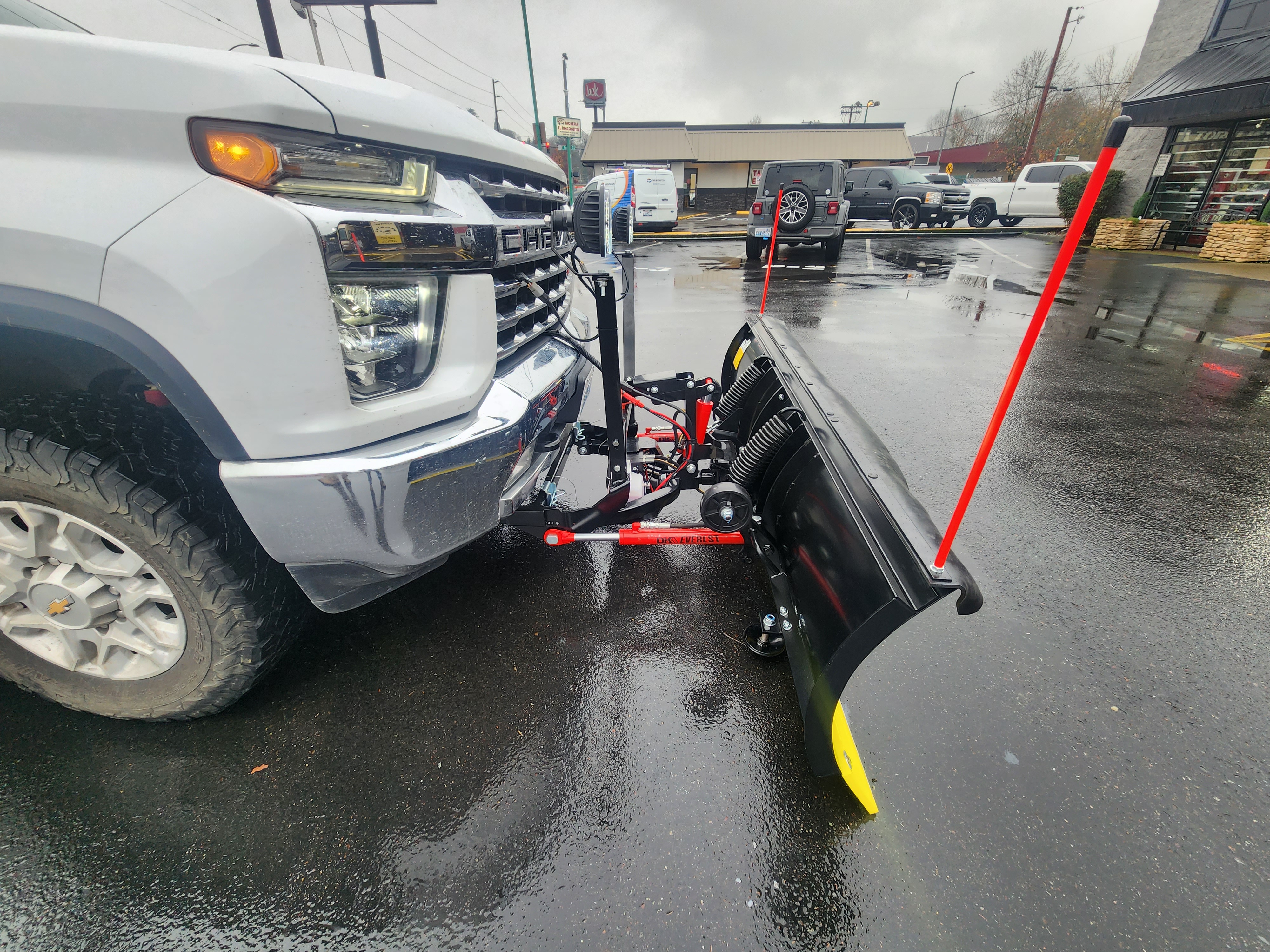 Truck equipped with a snow plow