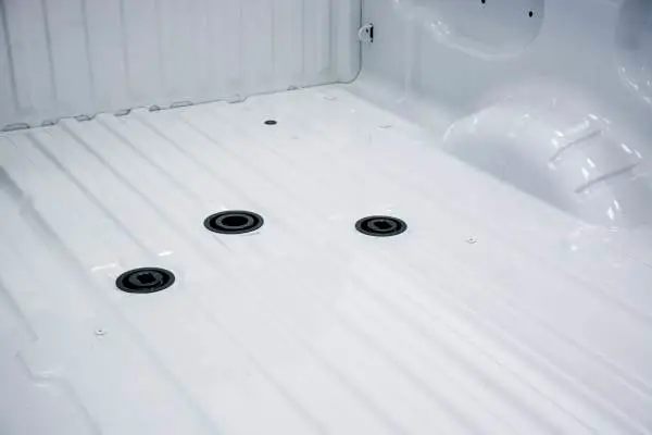 Nissan Titan OEM puck system in pickup truck bed