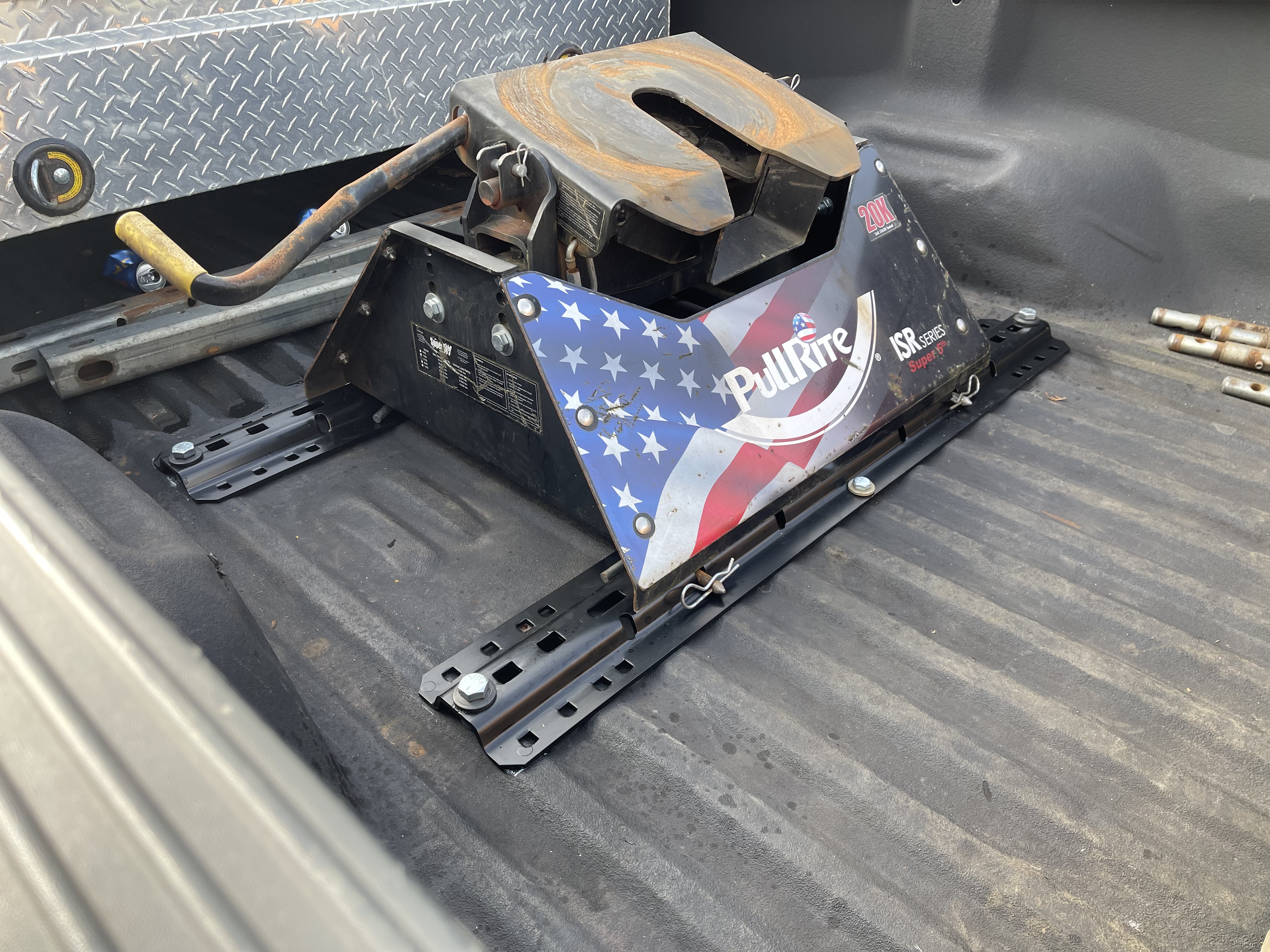 Above-bed fifth wheel rail kit installation