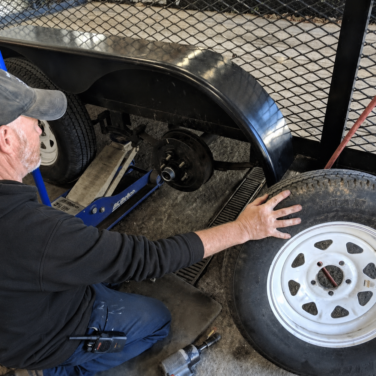 Small utility trailer axle, hub, and wheel repair