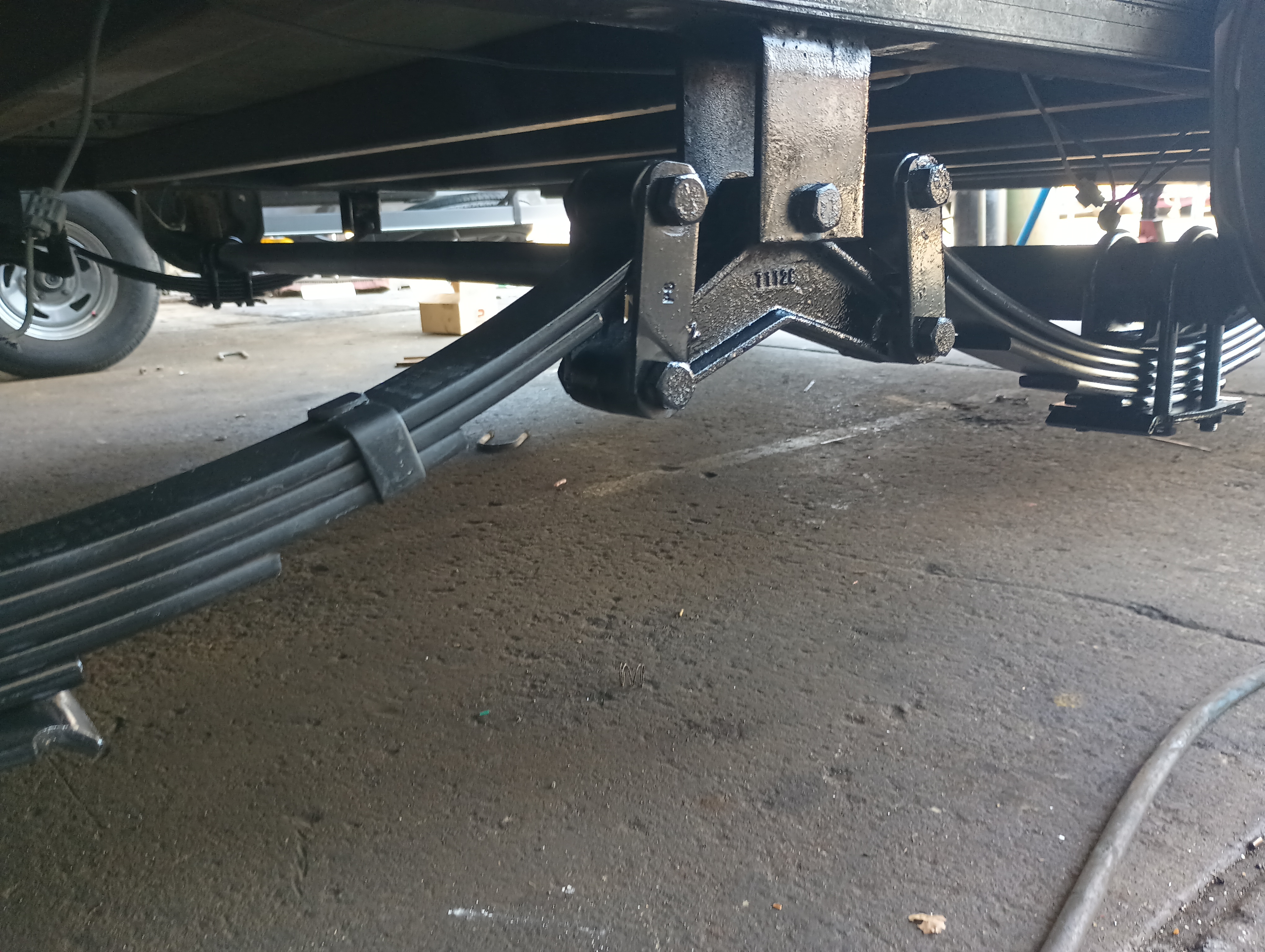 Tandem axle trailer leaf spring hanger and equalizer suspension repair
