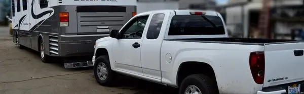 Are you flat towing this winter? Protect your towed vehicle from road salt and debris!