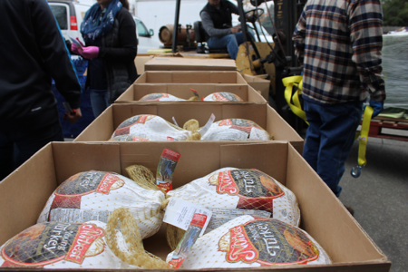 Handing out turkeys from the 2015 Challenge
